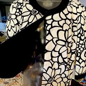 Nice lined short jacket with split in back